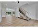 Inviting living space with hardwood floors and a staircase at 3893 Indian Shoals Road, Dacula, GA 30019