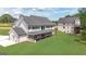 Spacious backyard with a covered porch perfect for entertaining at 3893 Indian Shoals Road, Dacula, GA 30019