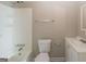 Bathroom with tub/shower combination, vanity and toilet at 5207 Shawn Ln, Stone Mountain, GA 30088