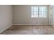 Cozy bedroom with a large window providing ample natural light at 5207 Shawn Ln, Stone Mountain, GA 30088