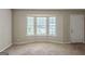 Empty Room with a large window, perfect for you to decorate at 5207 Shawn Ln, Stone Mountain, GA 30088
