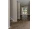 Entryway hallway with stairs, carpet, and a view to the outside at 5207 Shawn Ln, Stone Mountain, GA 30088