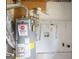 Hot water heater and utility features exposed in a utility room at 5207 Shawn Ln, Stone Mountain, GA 30088
