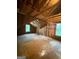 Unfinished attic space with exposed wood framing and insulation at 101 Dancing Fox Rd, Decatur, GA 30032