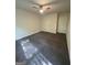 This bedroom is carpeted and has white painted walls and two white doors at 101 Dancing Fox Rd, Decatur, GA 30032