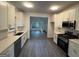 Modern kitchen with white cabinets, stainless steel appliances, and an open layout at 101 Dancing Fox Rd, Decatur, GA 30032