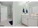 Light and bright bathroom view features vanity, mirror, and doorways to other rooms at 1788 River Bluff Vw, Duluth, GA 30097
