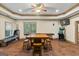 Basement game room with wood floors, a table with barstools, and game machines at 1788 River Bluff Vw, Duluth, GA 30097