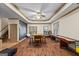 Spacious game room featuring wood floors, table, shuffleboard table, and chalkboard wall at 1788 River Bluff Vw, Duluth, GA 30097