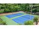 The community's meticulously maintained tennis courts, framed by lush greenery, promote an active lifestyle at 1788 River Bluff Vw, Duluth, GA 30097