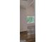 Bedroom with wood-look flooring and window at 5502 Lakeview Pkwy, Villa Rica, GA 30180