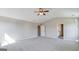 Spacious bedroom with carpet flooring, access to bathroom and closet, and neutral paint at 1172 Faulkner Way, Jonesboro, GA 30238
