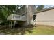 This home features a deck with stairs to a walkout basement at 120 E Cainwood E Ct, Atlanta, GA 30349