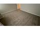 Well lit bedroom featuring neutral carpet and light paint at 120 E Cainwood E Ct, Atlanta, GA 30349