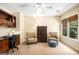 Office space featuring dual chairs, desk, and a large window at 1884 Whitehawk Ct, Lawrenceville, GA 30043