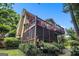 Home exterior featuring multi-level deck and screened porch at 1884 Whitehawk Ct, Lawrenceville, GA 30043