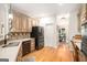 Well-appointed kitchen featuring modern appliances, ample counter space, and updated finishes at 1884 Whitehawk Ct, Lawrenceville, GA 30043