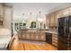 Spacious kitchen with stainless steel appliances, a large island, and plenty of cabinet space at 1884 Whitehawk Ct, Lawrenceville, GA 30043