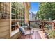 Inviting patio features outdoor seating and a cozy fire pit perfect for relaxation and enjoyment at 1884 Whitehawk Ct, Lawrenceville, GA 30043