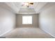 Spacious bedroom features a trey ceiling with fan and neutral paint at 260 Redding Rdg, Atlanta, GA 30349