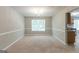Dining area with a window and views of the kitchen at 260 Redding Rdg, Atlanta, GA 30349
