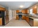Spacious kitchen with stainless appliances, stone counters, and ample cabinet space at 260 Redding Rdg, Atlanta, GA 30349
