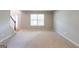 Open and airy living room with large window for natural light at 260 Redding Rdg, Atlanta, GA 30349