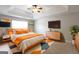 Spacious main bedroom with tray ceiling, modern decor, with a flat screen television at 260 Redding Rdg, Atlanta, GA 30349