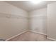 Walk-in closet with built in shelving and carpet flooring at 260 Redding Rdg, Atlanta, GA 30349