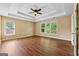 Bright, spacious main bedroom with tray ceiling, ample natural light, and neutral decor at 3355 Golfe Links Dr, Snellville, GA 30039