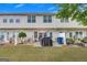 Backyard featuring a patio with seating, a grill, and a well-maintained lawn at 2083 Hasel St, Lawrenceville, GA 30044