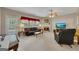 Spacious living room featuring fireplace, plush carpet, and ample natural light at 2083 Hasel St, Lawrenceville, GA 30044