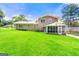 Well-maintained brick home with a spacious backyard, offering a screened-in porch and ample green space at 2117 Chestnut Hill Circle Cir, Decatur, GA 30032