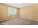 Bedroom featuring large windows, neutral carpeting, and plenty of natural light at 2117 Chestnut Hill Circle Cir, Decatur, GA 30032