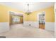 Charming dining area with traditional chandelier and neutral walls at 2117 Chestnut Hill Circle Cir, Decatur, GA 30032