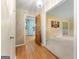 Hallway leading to the living areas showcases beautiful wood floors and neutral paint at 2117 Chestnut Hill Circle Cir, Decatur, GA 30032