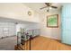 Loft with hardwood floors, ceiling fan, and natural light overlooks the living area below at 2117 Chestnut Hill Circle Cir, Decatur, GA 30032