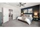 Comfortable bedroom with a large window, soft lighting, and modern decor at 234 Retreat Ln, Canton, GA 30114