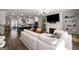 Bright living room featuring a fireplace, built-in shelves, and an open-concept design at 234 Retreat Ln, Canton, GA 30114