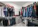 Organized walk-in closet featuring wire shelving, hanging rods, and storage bins for optimal space at 234 Retreat Ln, Canton, GA 30114