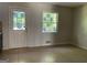 Dining room with tiled floors, white walls, and a glass-paned door and window at 6332 Valley Dale Dr, Riverdale, GA 30274