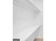 White closet features white shelving and rod at 191 High Creek Dr, Roswell, GA 30076