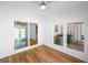 Bright dining room with sliding glass doors and windows provides natural light and backyard views at 191 High Creek Dr, Roswell, GA 30076