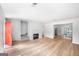 Spacious living room features a fireplace, new floors, and an open layout at 191 High Creek Dr, Roswell, GA 30076