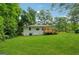 Wide backyard featuring new deck and manicured lawn at 4443 Flat Shoals, Decatur, GA 30034