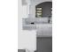 Modern kitchen featuring white cabinets, marble countertops, and stainless steel sink at 6127 Landers Loop, Fairburn, GA 30213