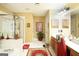 Bright bathroom with a separate tub, shower, and vanity, perfect for relaxation and convenience at 10038 Hemlock Way, Jonesboro, GA 30238