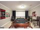 Spacious game room with a pool table and home theater setup, perfect for entertainment at 10038 Hemlock Way, Jonesboro, GA 30238