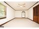 Bright bedroom with closet, neutral paint, trim, and carpet at 1502 Campground, Mcdonough, GA 30252