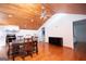 Open-concept kitchen and dining room with full-sized appliances, laundry and wood accents at 1502 Campground, Mcdonough, GA 30252